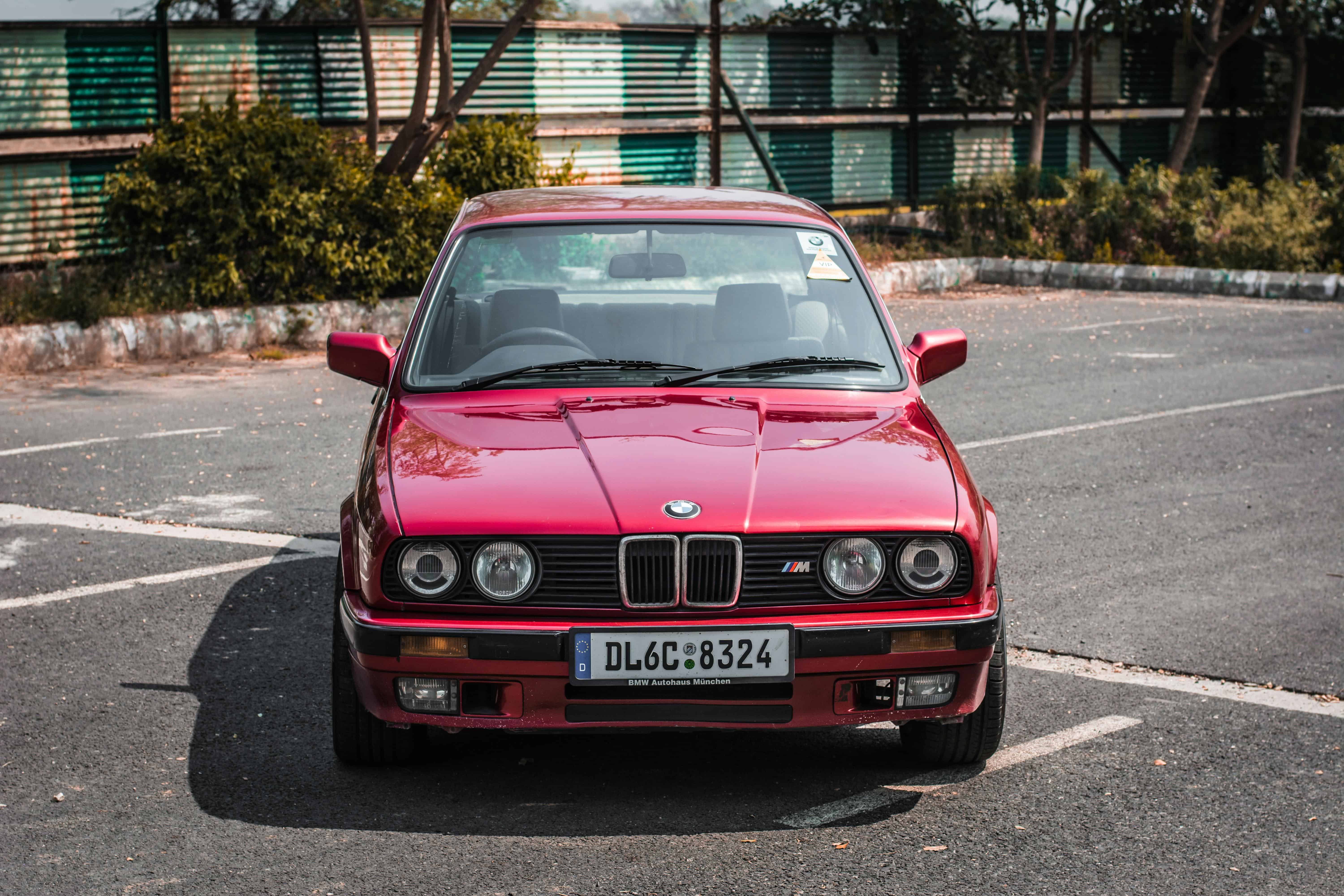 2026 BMW M3 Competition xDrive sedan parked beside M4 Competition coupe – shared DNA, different characters